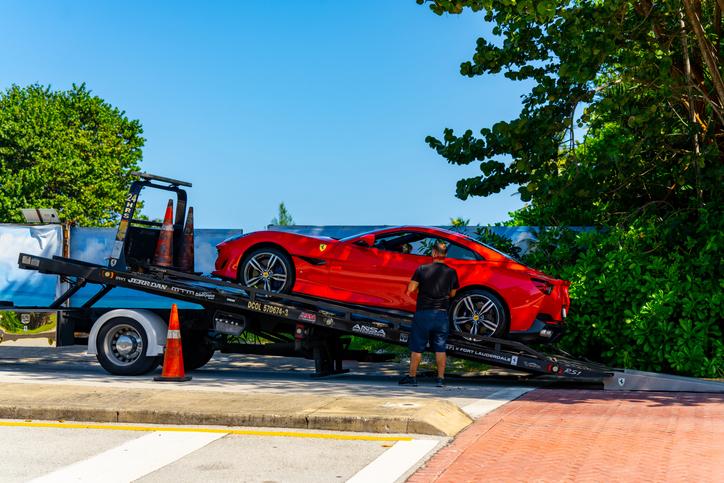 Tow Truck Lifting a Red Ferrari - Indiana